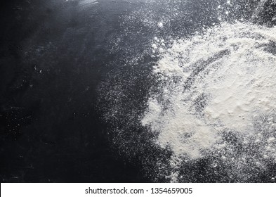Flour on the table background - Shutterstock ID 1354659005