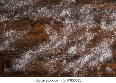 Flour on the table, texture background flour scattered on the table.
