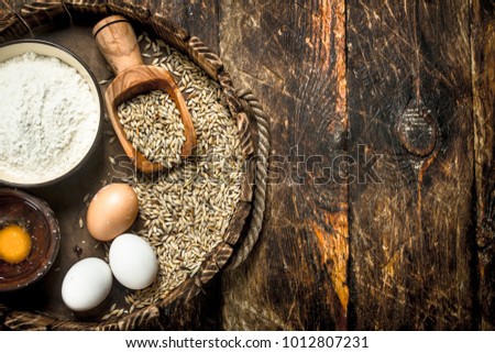 Similar – Image, Stock Photo wooden spoon on a red kitchen towel