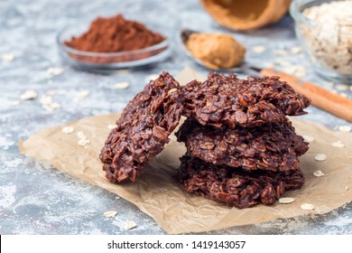 Flourless No Bake Peanut Butter And Oatmeal Chocolate Cookies On A Parchment, Horizontal