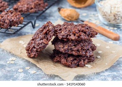 Flourless No Bake Peanut Butter And Oatmeal Chocolate Cookies On A Parchment, Horizontal