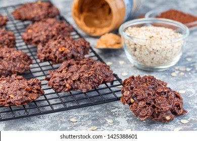 Flourless No Bake Peanut Butter And Oatmeal Chocolate Cookies On A Cooling Rack, Horizontal