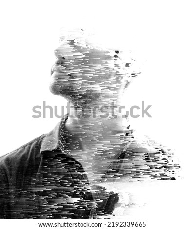 A flow of pixels dissolving a person into emptiness