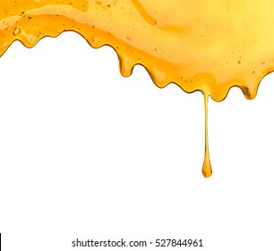 Flow Of Sweet Honey On The White Background. Isolated.