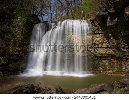 Flow of water over Hayden Run falls in the Dublin area of Columbus Ohio after heavy rainfall