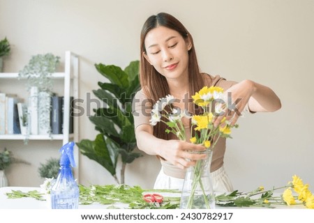 Similar – Image, Stock Photo Woman prepares a bouquet of red roses