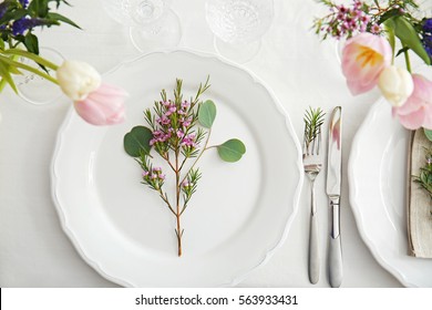 Flower arrangement on table served for wedding dinner