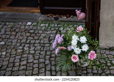 A flower basket in front of a store in Prague, Czech Republic - Shutterstock ID 2254120823
