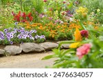Flower beds in the English Garden with a variety of colorful flowers