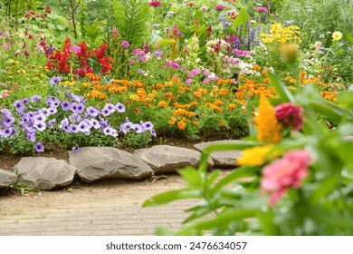 Flower beds in the English Garden with a variety of colorful flowers