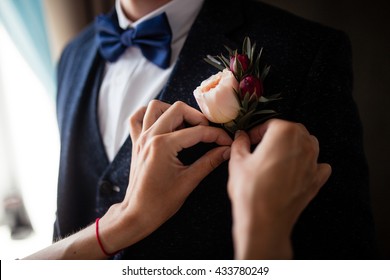 flower boutonniere in a jacket