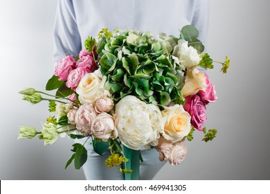 flower composition with hydrangea and peonies. Color pink, green, lavander, blue. Kraft paper. crisp packaging - Powered by Shutterstock