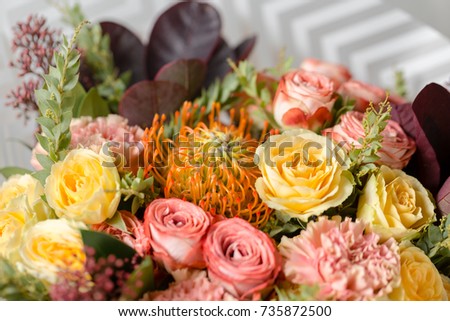 Flower composition on a gray background. Wedding and Festive decor. Bouquet from spring flowers. closeup