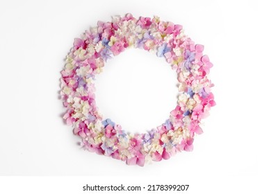 Flower Composition. Wreath Of Pink, Blue, White Hydrangea Flowers Isolated On White Background. Flat Lay, Top View