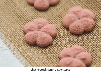 Flower Cookies On Rustic Cloth. Spring Holidays Cooking Concept, Flatlay, Copy Space.