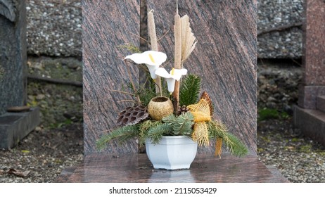 Flower Decoration On A Marble Tomb 