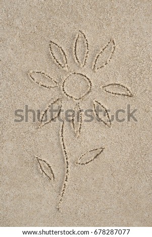 flower drawing in sand background