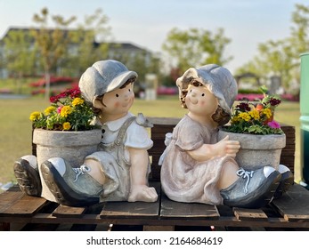 It's A Flower Garden Sculpture Couple.