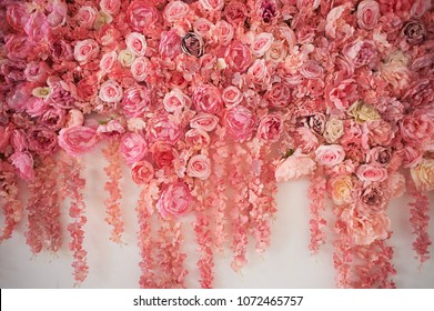 Flower Garland On The Wall. Dense Wall Of Flowers. Wedding Photo Zone. Romantic Space Decor