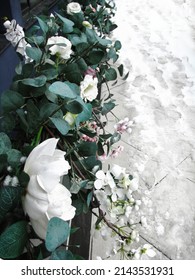 Flower Garlands At The Flower Shop Door In A Winter City