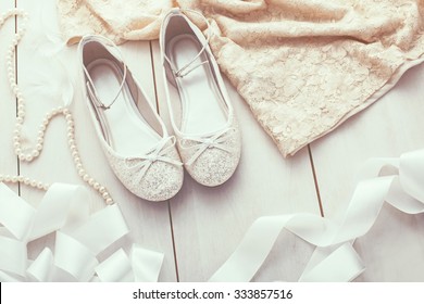 Flower girl silver glitter shoes closeup