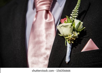 Flower In The Lapel Of His Jacket The Groom