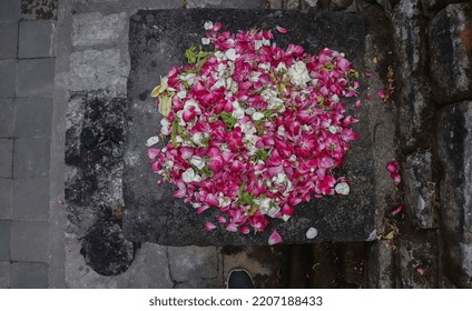 Flower Offerings That Are On A Stone As An Offering To Ancestors Are Javanese Culture