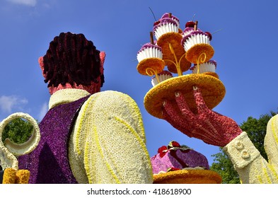 Flower Parade Zundert, The Netherlands; Waiter Serving Cupcakes