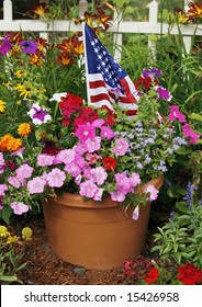 flower pot with beautiful flowers and american flag