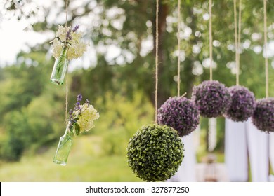 Flower Round Compositions For Wedding Decor. Glass Hanging Bottles For Flowers.