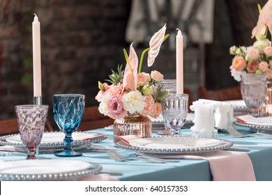 Flower Table Decorations For Holidays And Wedding Dinner. Table Set For Holiday, Event, Party Or Wedding Reception In Outdoor Restaurant.