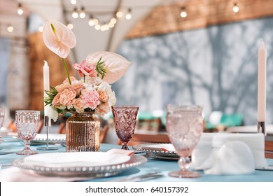 Flower Table Decorations For Holidays And Wedding Dinner. Table Set For Holiday, Event, Party Or Wedding Reception In Outdoor Restaurant.