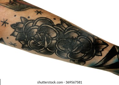 Flower Tattoo On Male Forearm Over White Background