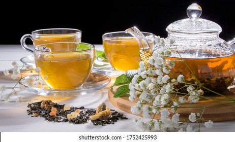 Flower Tea With Fruit Slices. A Cup Of Green Tea And A Teapot. Tea Ceremony, Traditional Drink. Afternoon Tea, Homelike. Flat Lay. Oriental, Cozy, Preparation, Heat, Tradition, Japanese, Leafy, Herbal