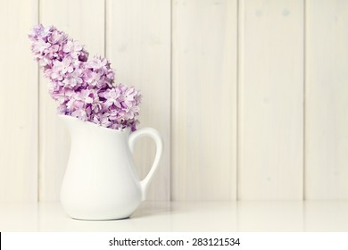 flower in white vase greeting card background