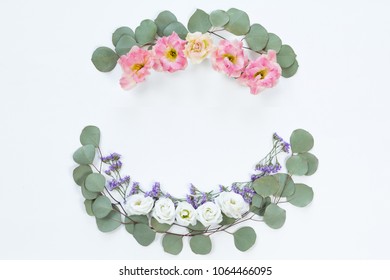 Flower Wreath Frame Made Of Different Flowers And Leaves, Flat Lay, Top View. Holiday Background