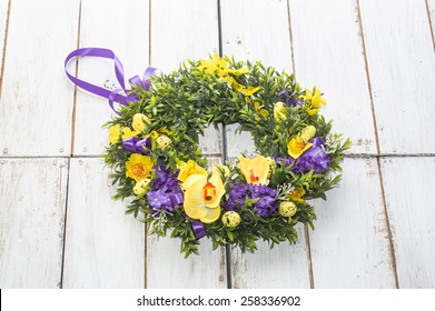 Flower Wreath Isolated On White Vintage Wooden Background