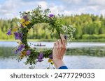 Flower Wreath. Ligo, Ivan Kupala. Midsummer Solstice Holiday concept