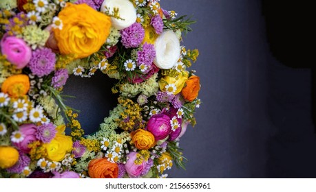 Flower Wreath On A Gray Color Background. Fresh Wild Flowers And Herbs, Decoration, Close Up View. Spring Sunny Day. Women Or Mothers Day Celebration