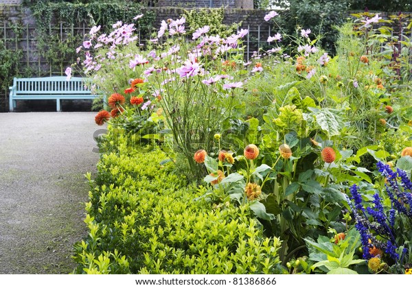 Flowerbed Blue Garden Bench Stock Photo Edit Now 81386866