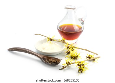 Flowering Witch Hazel (Hamamelis), Dried Leaves, Cream And Essence For Homemade Skin Care Cosmetics And Bath Additive, Isolated With Shadow On A White Background