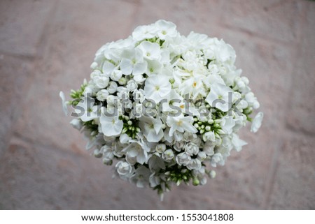 Flowers bouquet composition on stone background for wedding, ceremony, occasions
