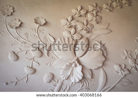 Flowers carved sandstone walls.