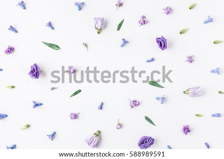 Flowers composition. Frame made of various colorful flowers on white background. Flat lay, top view