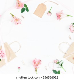 Flowers Composition. Gift And Pink Flowers On White Background. Flat Lay, Top View, Square.