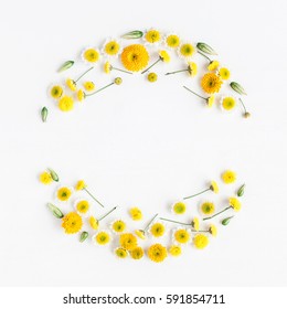 Flowers composition. Wreath made of various yellow flowers on white background. Easter, spring, summer concept.  Flat lay, top view, copy space - Shutterstock ID 591854711