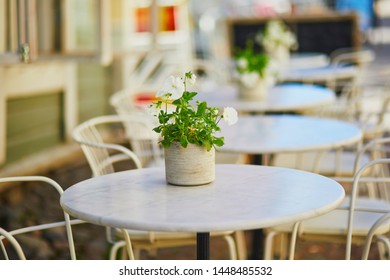 Flowers In Full Bloom On A Table Of Street Cafe, Beautiful Decoration Details In Porvoo, Finland