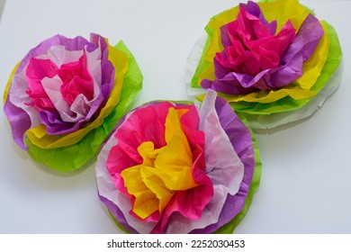 Flowers made of tissue paper in bright colorful colors - Shutterstock ID 2252030453