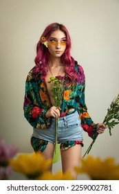 flowers model flower child pink hair retro vintage fashion editorial floral nature hippie hippies chick studio modeling fashion photography studio grey background young woman women teenager 1960s 60s - Shutterstock ID 2259002781