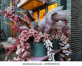 Flowers on the street in a cafe. Beautifully decorated restaurant in the center of Milan - Powered by Shutterstock